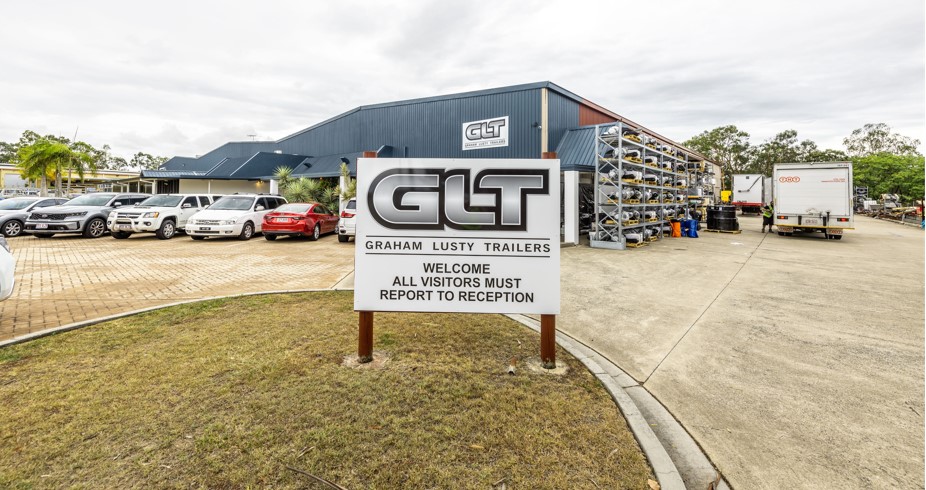 GLT factory with branded sign at the front